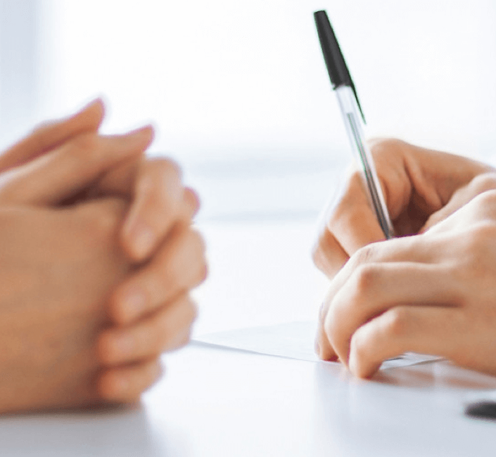 Hands writing